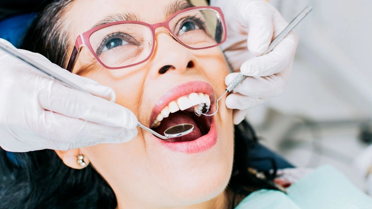 Adult woman receiving a dental check-up at Yonge Forest Dental in Barrie